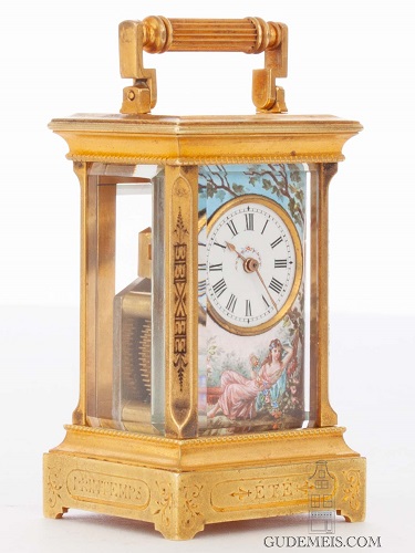 A sub miniature Swiss gilt brass carriage clock with polychrome enamel dial, circa 1890.